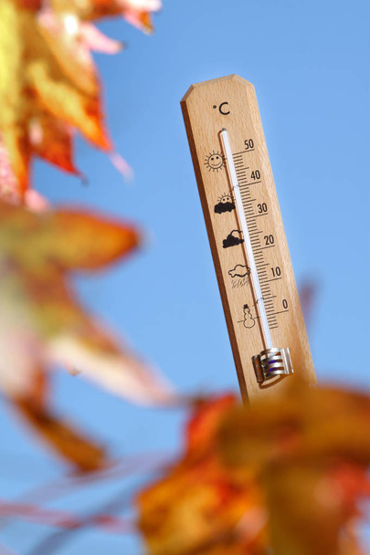 nice weather in the autumn shown with mercury thermometer - Photo, Image