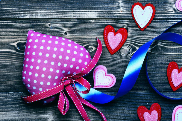 felt heart and ribbon on wood as valentines decoration - Photo, Image