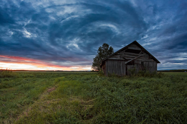 Circle Of Clouds Over The Old Barn House - Fotó, kép