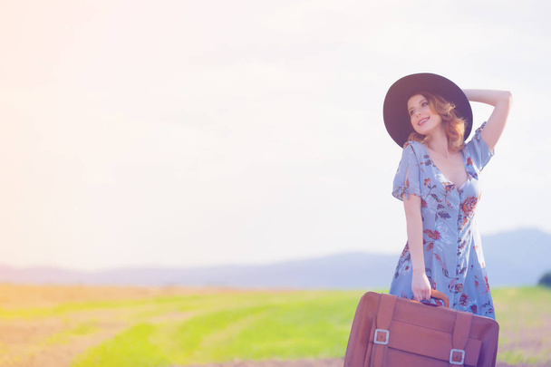 Beautiful woman with suitcase - Foto, Imagem