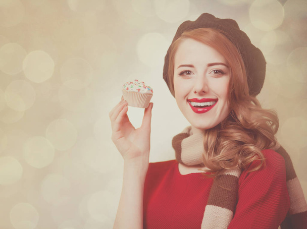 Redhead girl with cupcake - Photo, Image