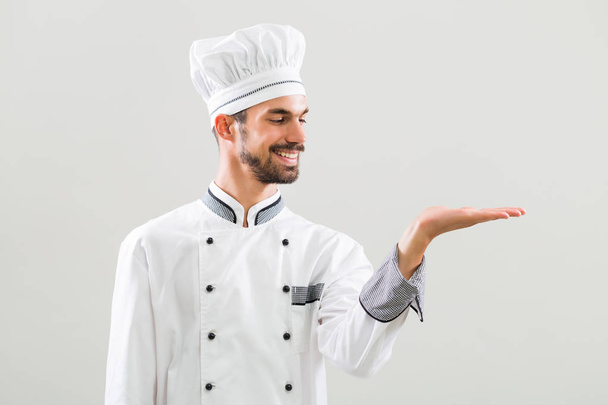 Chef smiling and  gesturing  - Foto, Imagem