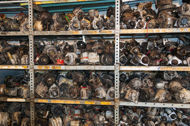 shelf full of used engine parts - Photo, Image