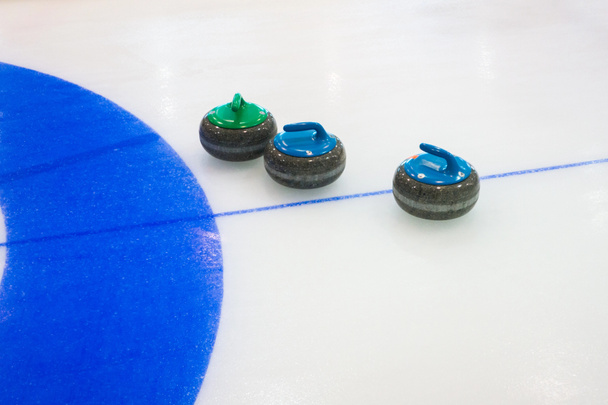 Curling deporte piedras equipo
 - Foto, imagen