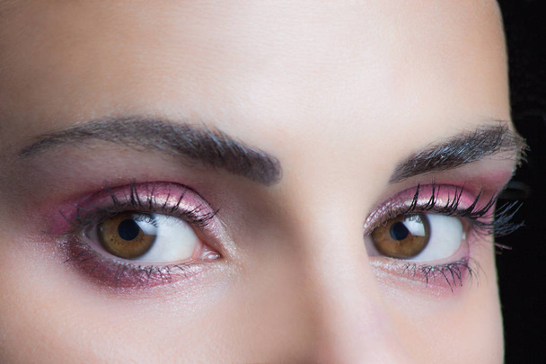 woman eyes with perfect pink  wet eyeshadow closeup studio  - Photo, Image