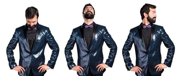 Handsome man with sequin jacket looking up, down and lateral - Foto, Imagem