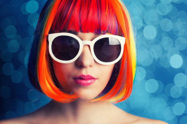woman wearing colorful wig  - 写真・画像