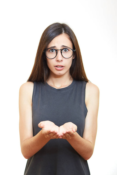 Portrait woman in glasses. White background. Hold hands - Фото, зображення