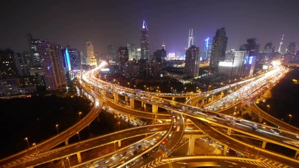traffic lights trail on overpass bridge at night,shanghai modern building. - Footage, Video