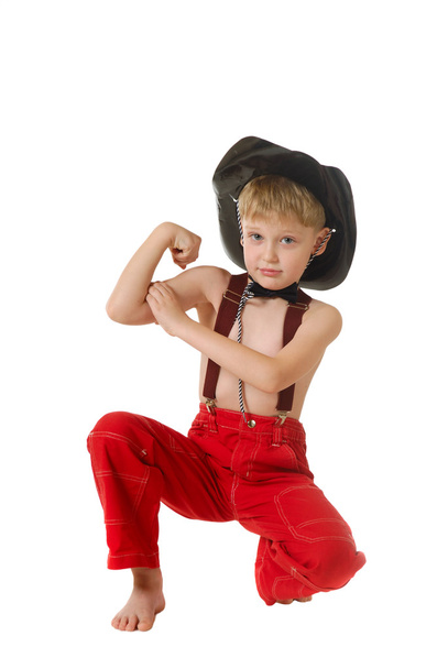 The boy in clothes of cowboy - Foto, afbeelding
