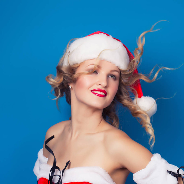young woman wearing Santa Claus - Fotoğraf, Görsel