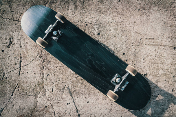 Skateboard on concrete floor in skatepark - Foto, Imagem
