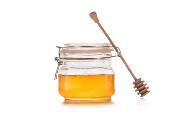 fresh honey in glass jar - Foto, imagen