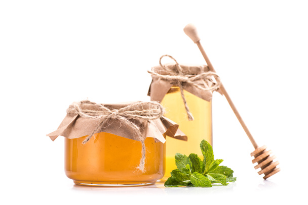 fresh honey in glass jars  - Φωτογραφία, εικόνα