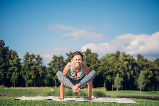 caucasian woman performing yoga - Fotografie, Obrázek
