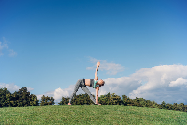woman performing yoga - Photo, Image