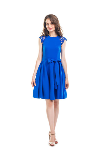 Full length portrait of smiling beautiful woman in blue dress  - Photo, Image