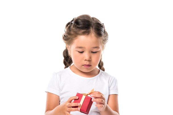  niño con caja de regalo roja
 - Foto, imagen
