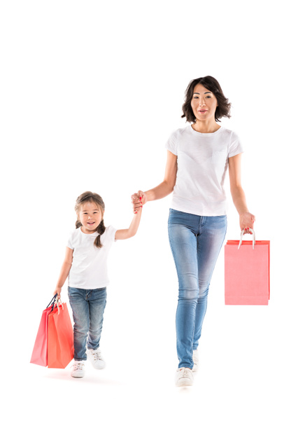 Мать и дочь с сумками для покупок
 - Фото, изображение
