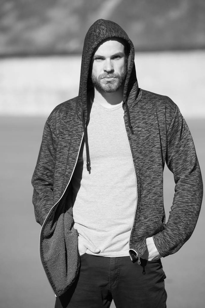 man sport fashion, bearded guy model in black hoodie - 写真・画像
