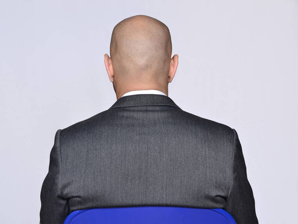 Businessman sitting in grey suit  - Foto, Imagem