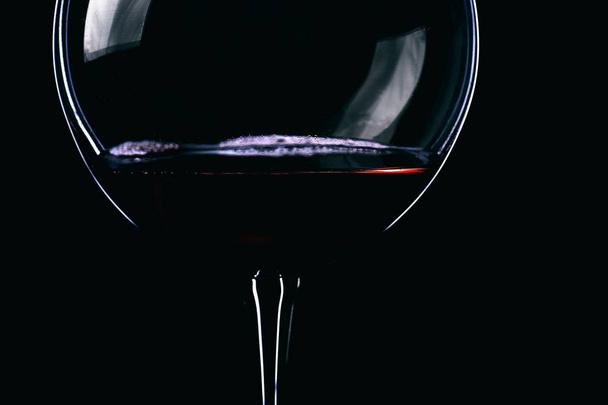 wineglass with wine on black background - Zdjęcie, obraz