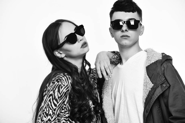 couple of pretty girl and young guy in fashionable sunglasses - Zdjęcie, obraz