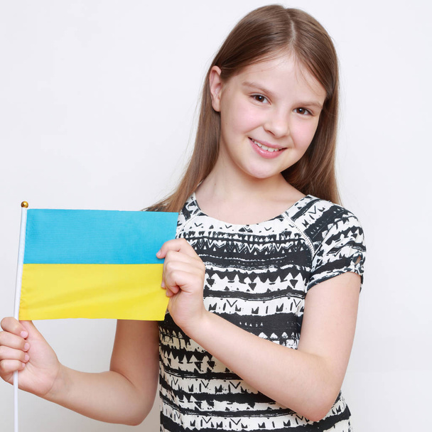 Teen girl and flag - Фото, изображение