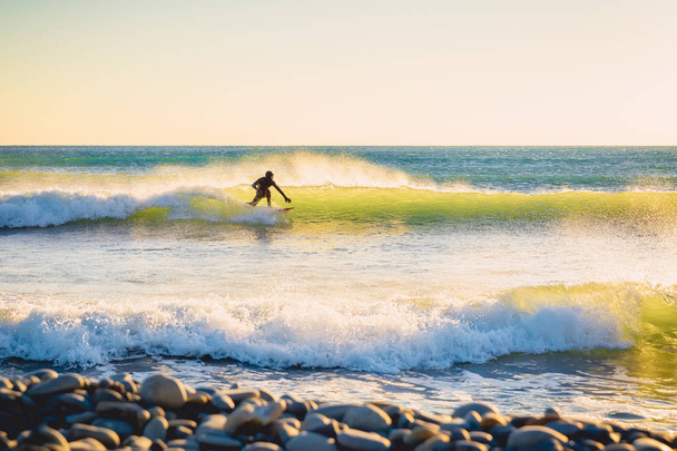 Surfer riding  on perfect ocean wave  - Fotoğraf, Görsel
