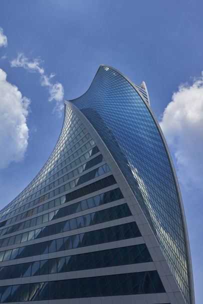 MOSCOW, AUG, 21, 2017: Moscow city business center twisted tower Evolution. Moscow City business center skyscrapers office buildings, luxury apartments. Modern european architecture metal and glass - Photo, Image