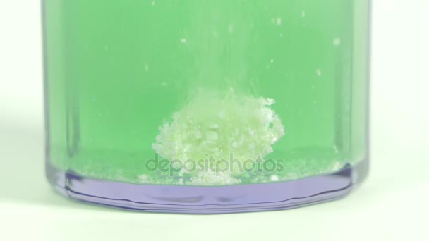 Effervescent tablet dissolving in water. - Footage, Video