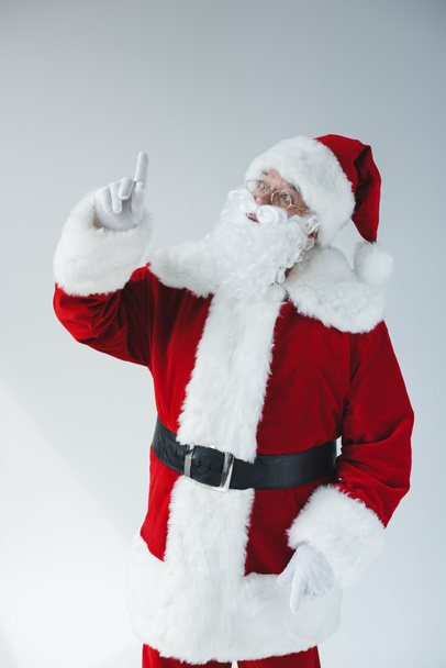 Weihnachtsmann zeigt mit dem Finger  - Foto, Bild