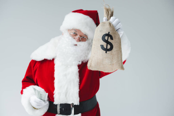 Weihnachtsmann mit Dollarnoten - Foto, Bild