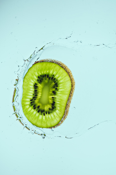 kiwi slice in water  - Photo, Image