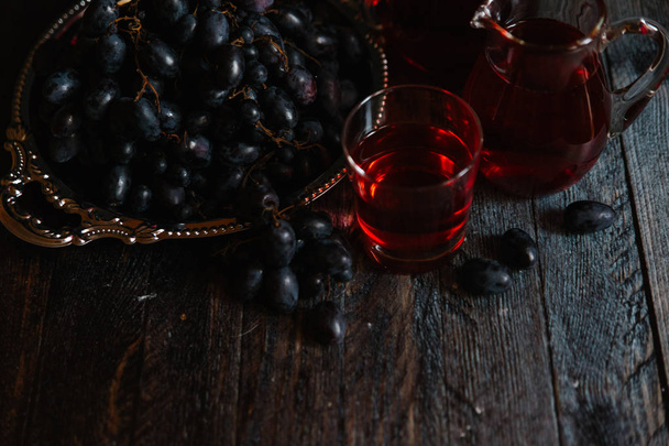 Glasses of vine with grapes - Photo, Image