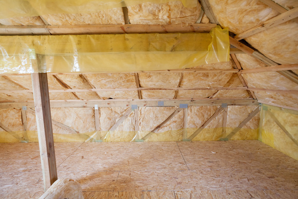 Attic with environmentally friendly and energy efficient thermal insulation rockwool. - Photo, Image