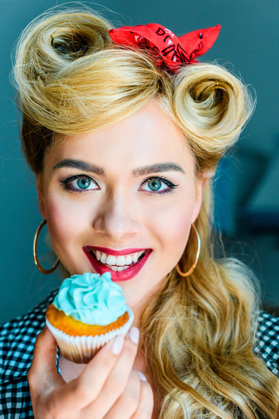 pin up girl with cupcake - Zdjęcie, obraz