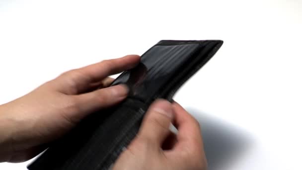 emberi kéz megnyitása üres pénztárca, közeli  - Felvétel, videó