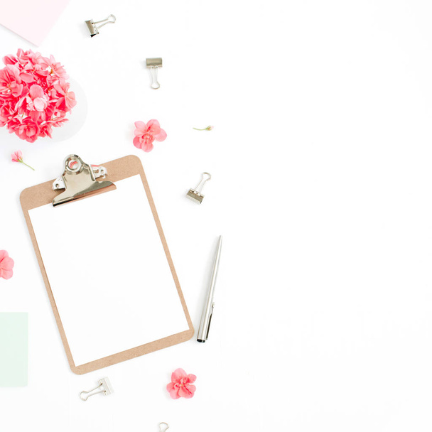 Clipboard with copy space for text, red flowers, accessories - Photo, Image