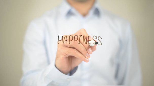 Η ευτυχία, ο άνθρωπος εγγράφως σχετικά με διάφανη οθόνη - Φωτογραφία, εικόνα