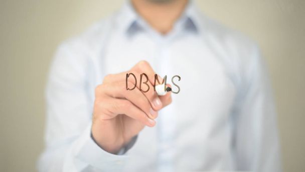 Dbms、透明な画面上を書く男 - 写真・画像
