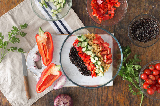 Black quinoa, chickpeas, peppers - Fotó, kép