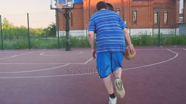 Young Guy Play Street Basketball - 映像、動画