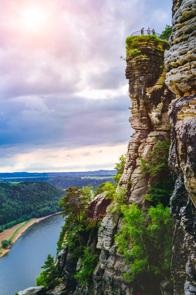 Viewpoint with some tourist on bastei rock formation in Saxon Switzerland National Park, Germany - Fotografie, Obrázek
