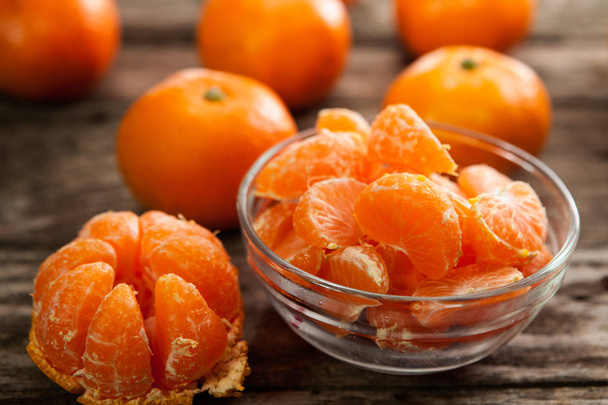 Bowl of delicious sweet clementine - Foto, afbeelding