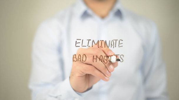 Eliminate Bad Habits , man writing on transparent screen - Photo, Image