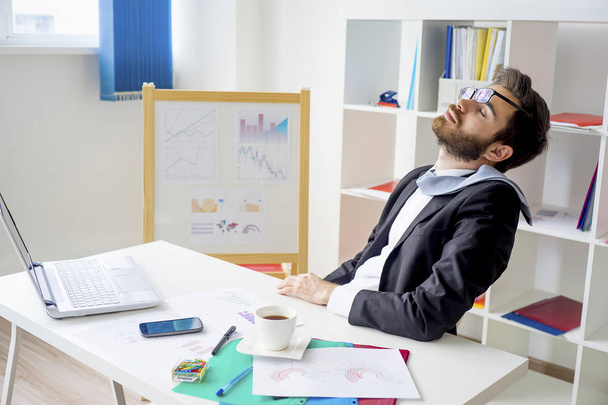 Portrait of a tired businessman - Фото, изображение