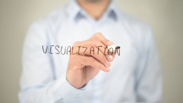 Visualización, hombre escribiendo en pantalla transparente
 - Foto, imagen