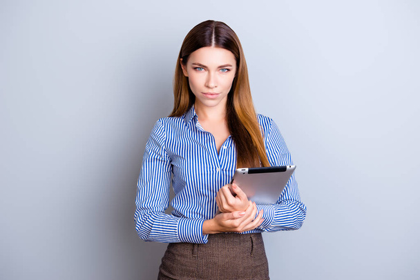 Young successful and confident  business lady is holding tablet  - Φωτογραφία, εικόνα