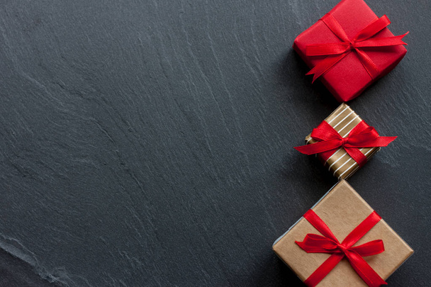 beautiful gift boxes on black background - Foto, imagen